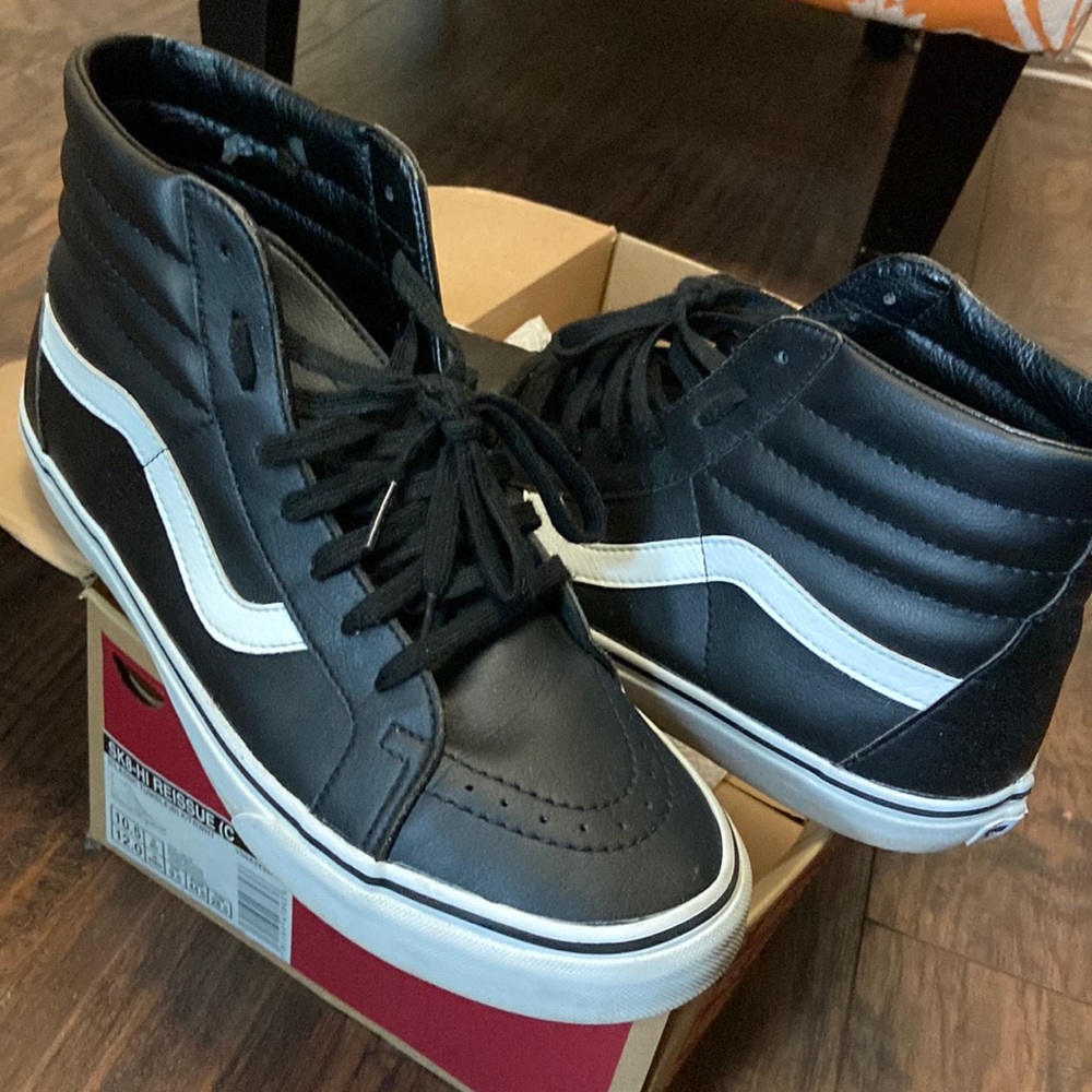 Black and white SK8-HI Reissue Vans sneakers
